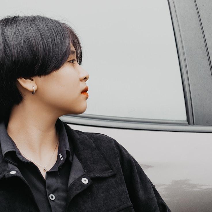 Kaveri Mehta, Lead Design Curator at SignalDockUrban, reviewing corporate floral arrangements